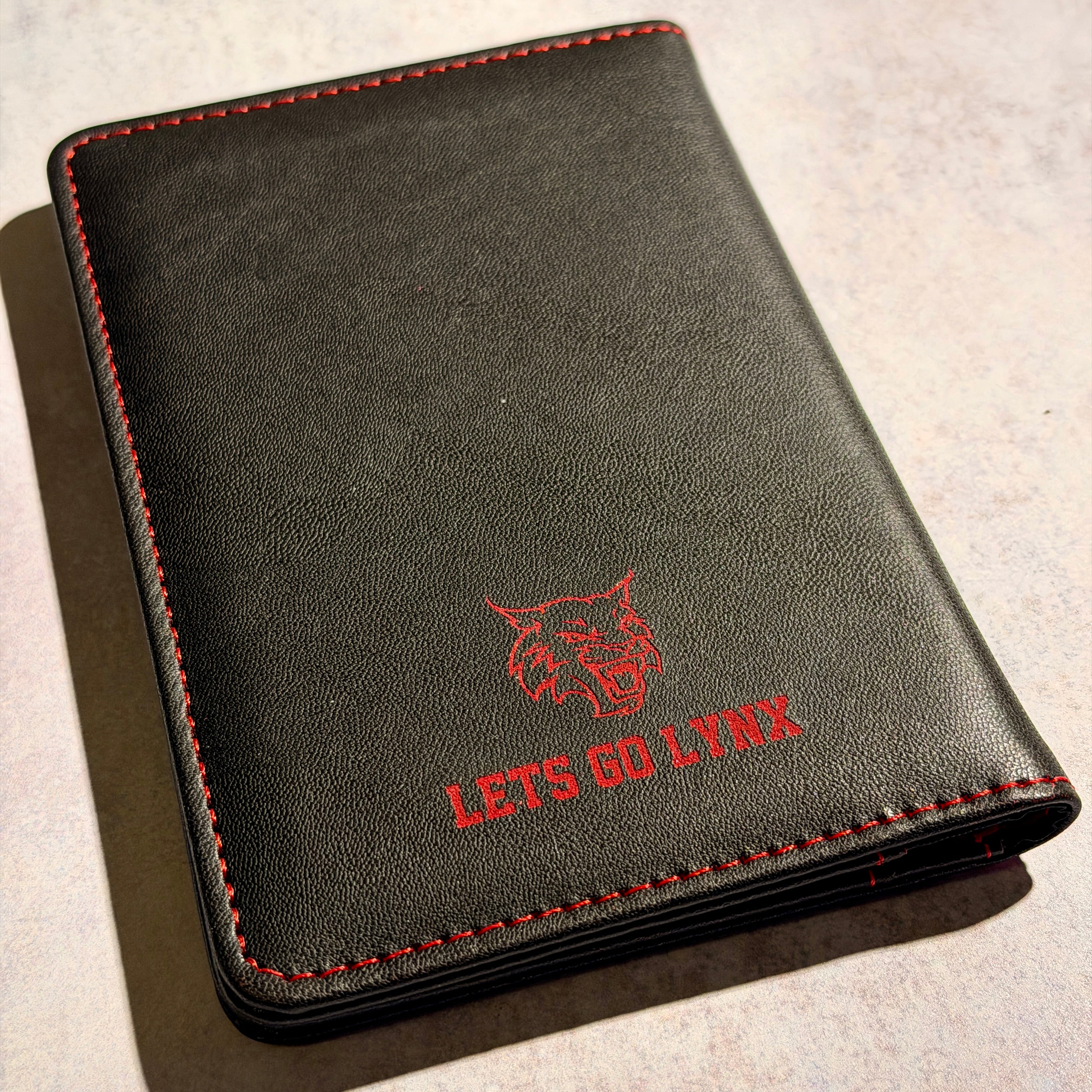 Aberdeen Lynx Engraved Passport Cover – Black & Red