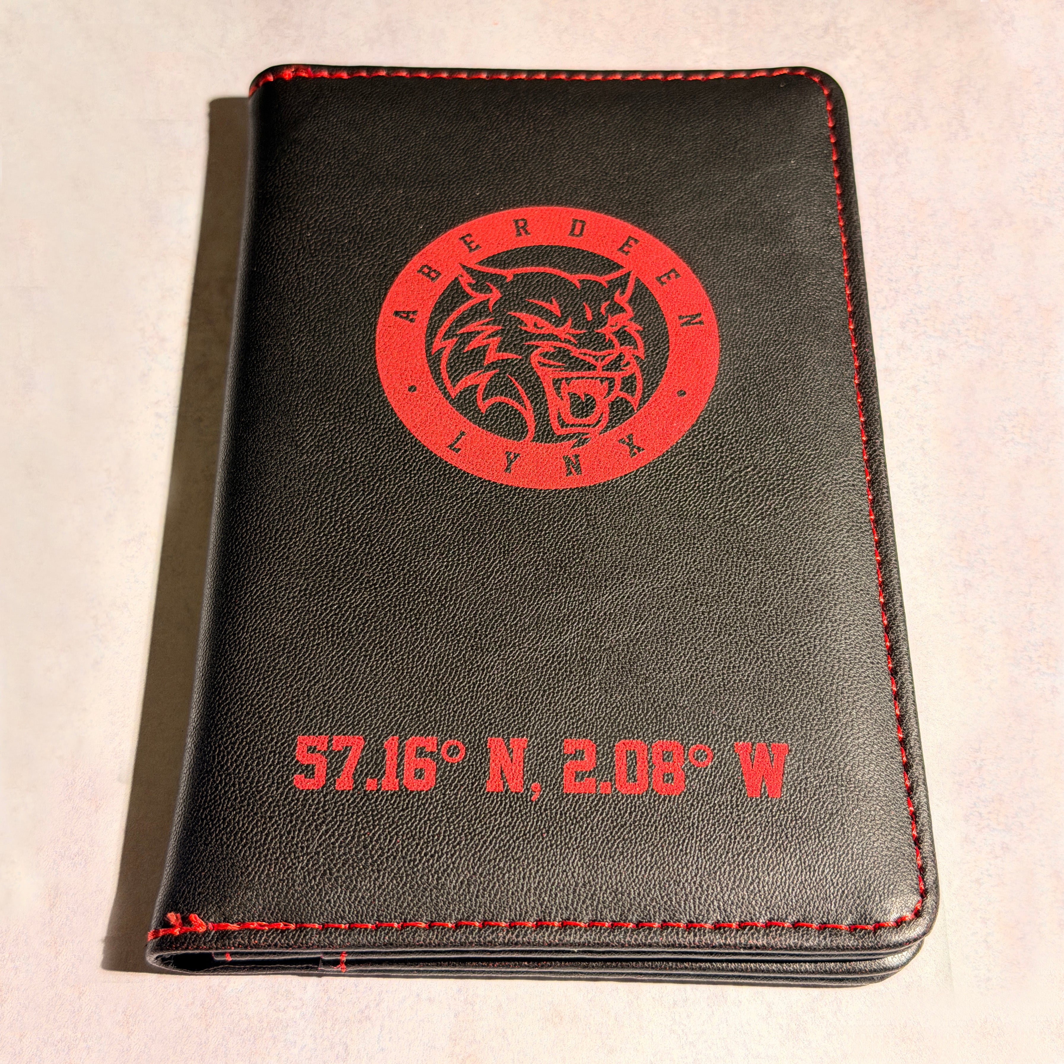 Aberdeen Lynx Engraved Passport Cover – Black & Red